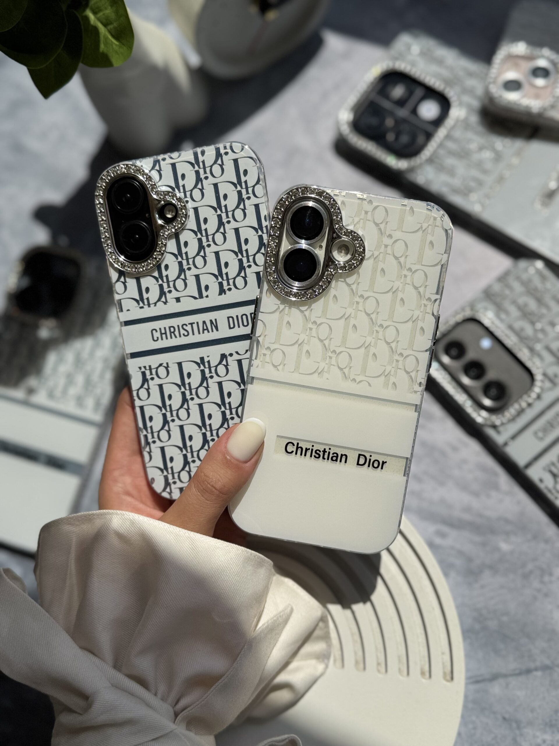 c9447f.jpeg قاب White Christian Dior دور لنز نگین آیفون (کدC2076) - Image 1