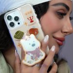 قاب موبایل آیفون کندل کریسمس سگ پاپی + پاپسوکت متحرک